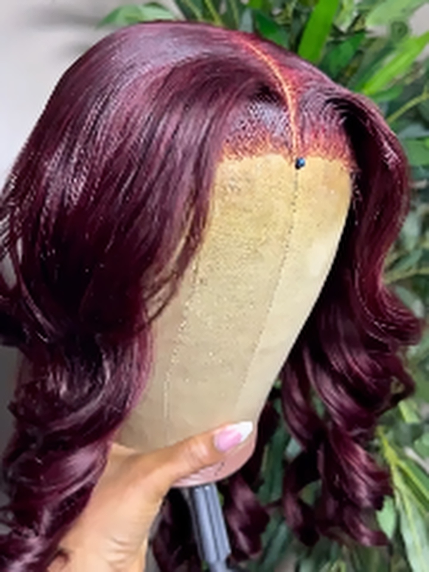 Burgundy wig unit by Enjay Beauty Hub